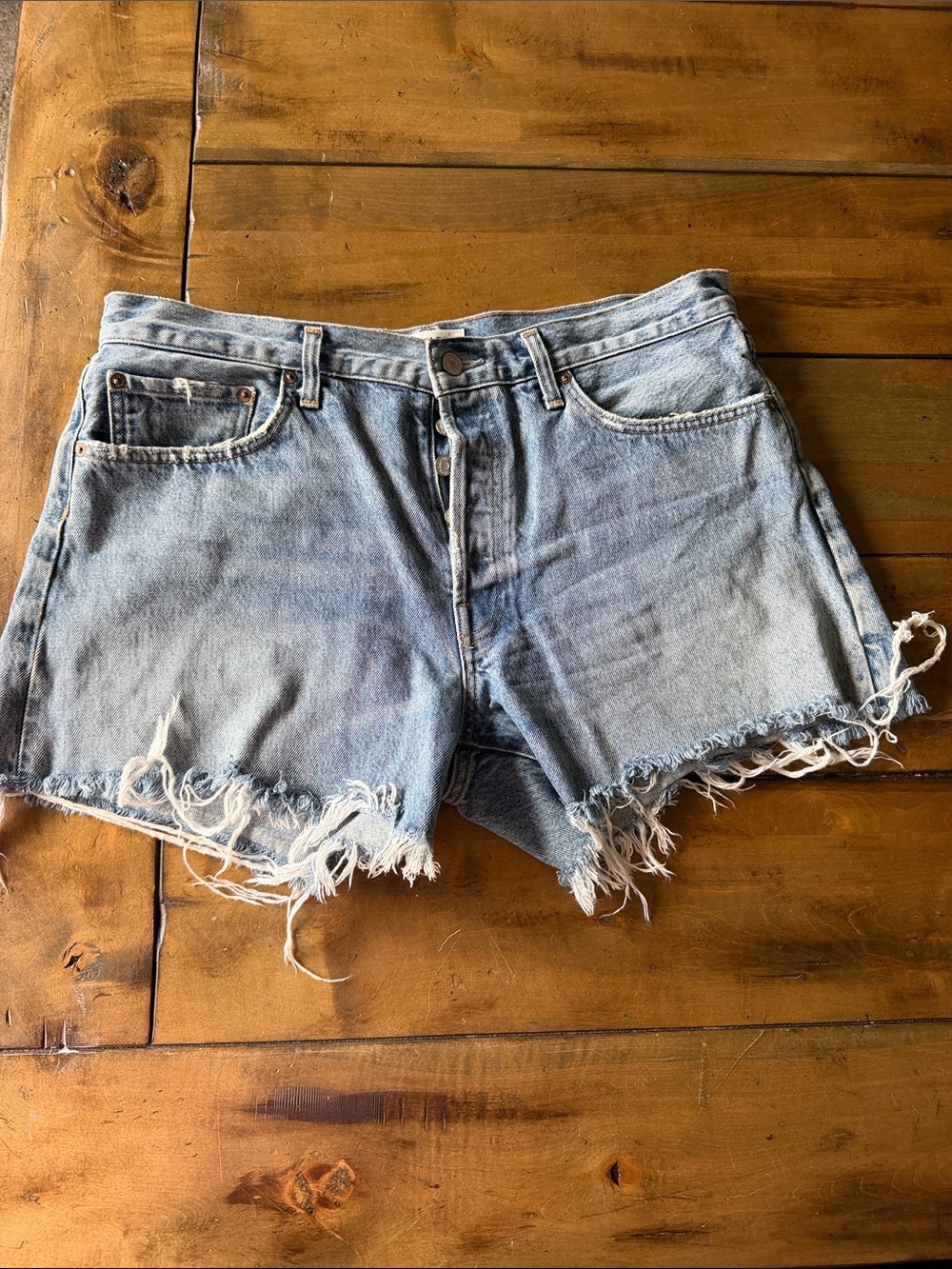 Agolde Washed Light Blue Frayed Hem Denim Cutoff Shorts